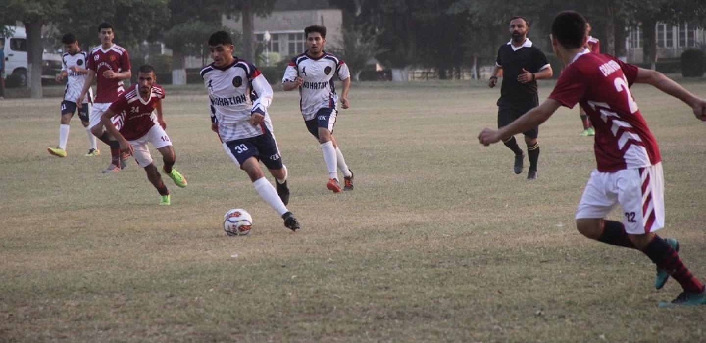Cadets are in action while defending a goal in football match