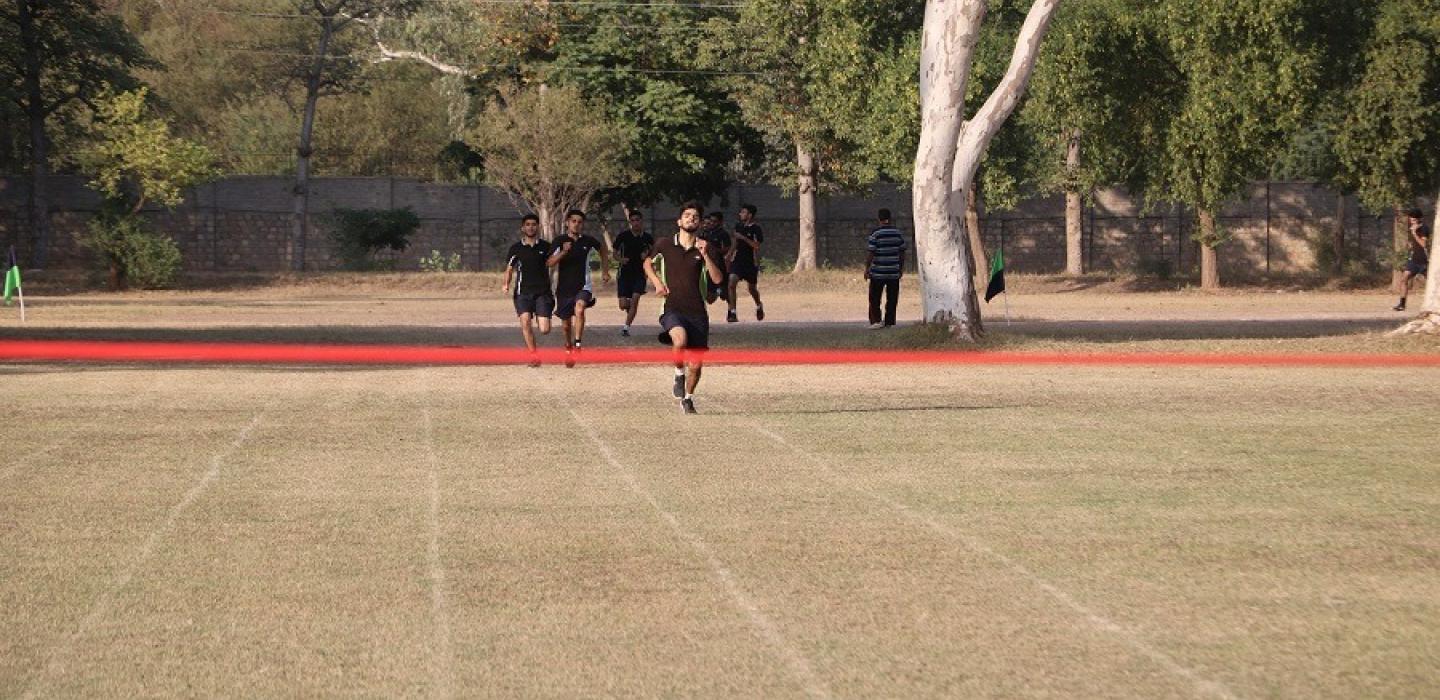 A cadet is running on fast track of 100meters race