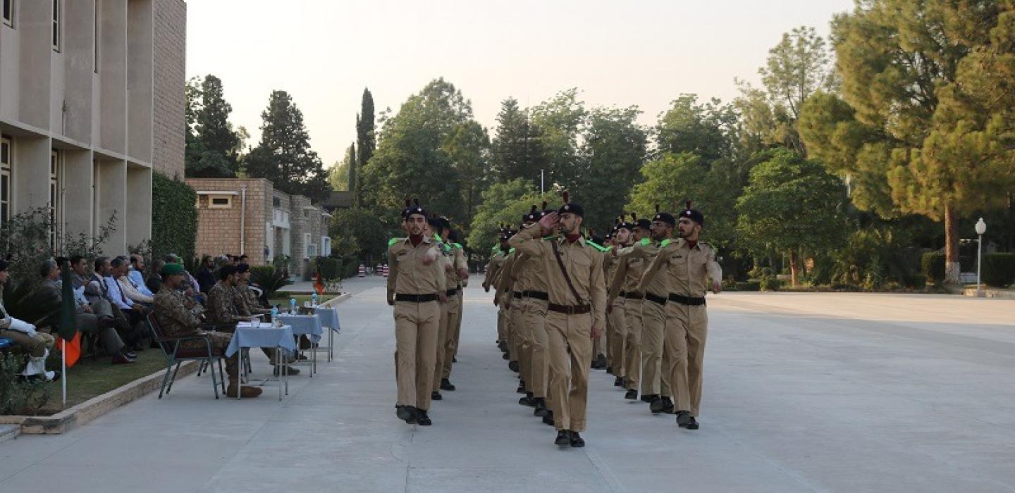Cadets are performing drill in a competition